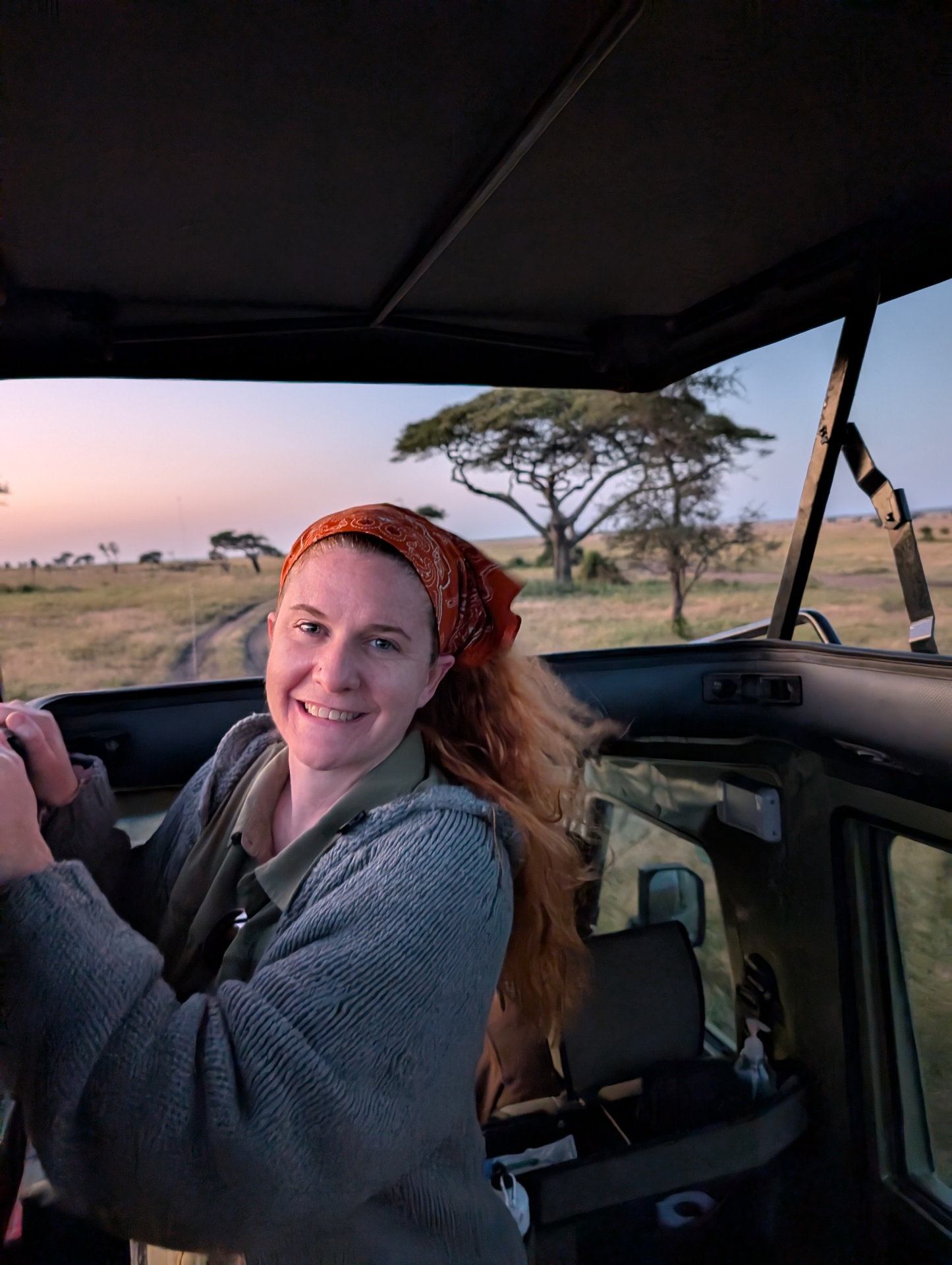 Megan in a safari vehicle at dawn